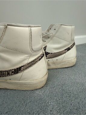 Nike White/Light Gray High-Top Sneaker with Snake Swoosh